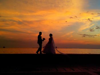 Scenic view of sea at sunset