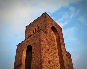 Low angle view of old building against sky