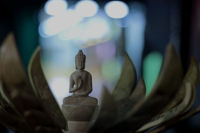 Close-up of statue against temple