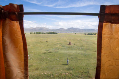 Scenic view of field against sky