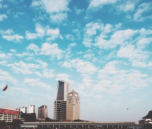 Low angle view of skyscrapers against sky