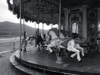 View of swing ride at amusement park