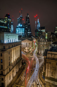 High angle view of light trails on road in city