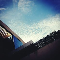 Low angle view of built structure against blue sky