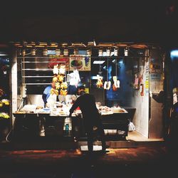 Rear view of people sitting at restaurant