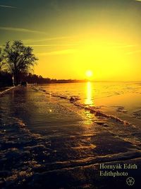 View of beach at sunset