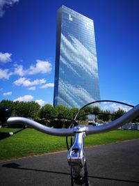 View of office building against blue sky