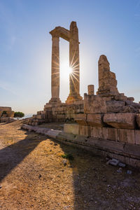 Temple of hercules against clear blue sky