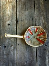 High angle view of wooden bowl on table