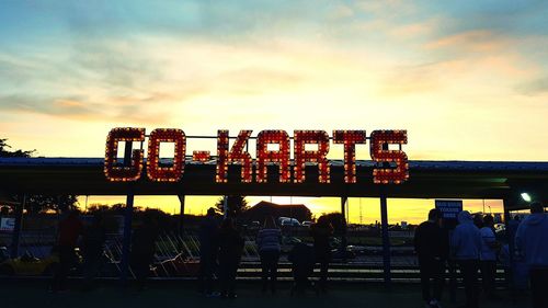 Silhouette of people at sunset