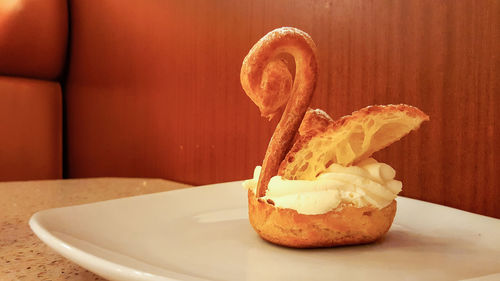 Close-up of bread in plate on table