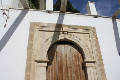 Low angle view of built structure against sky