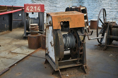 Old rusty wheel by sea