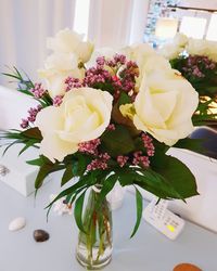 Close-up of flower vase on table