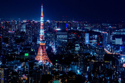 Aerial view of illuminated buildings at night