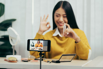 Young woman using mobile phone