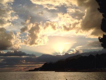 Scenic view of sea against cloudy sky