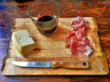 High angle view of drink on cutting board