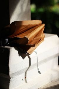 Low section of person sitting on chair