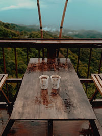 High angle view of empty chairs on table