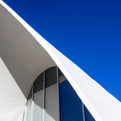 Low angle view of building against clear blue sky