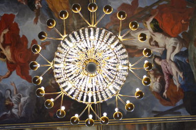 Low angle view of illuminated chandelier