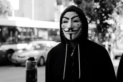 Close-up of person wearing mask during festival