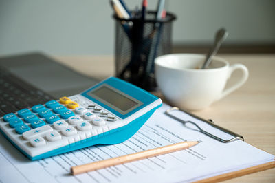 Close-up of pen on table