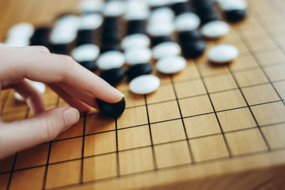 Close-up of person playing