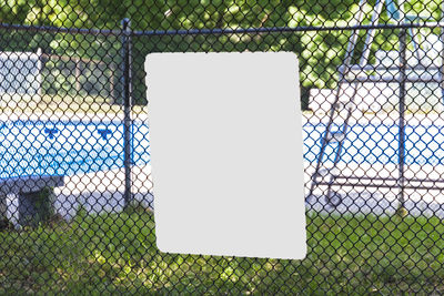 Close-up of fence on field