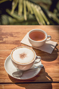 Coffee cup on table