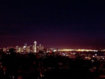 Illuminated cityscape at night