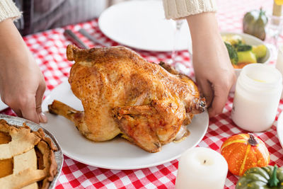 Midsection of woman holding food