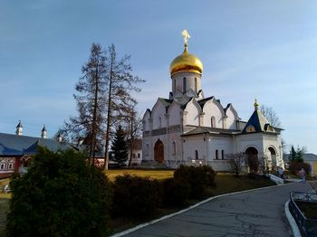 View of cathedral and buildings against sky