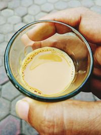 Close-up of hand holding drink