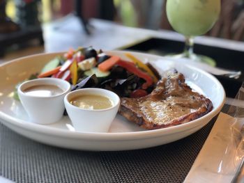 Close-up of meal served on table