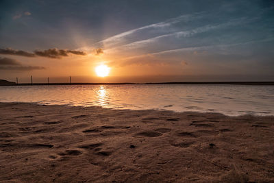 Scenic view of sea against sky during sunset