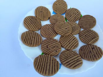 High angle view of food on table against white background