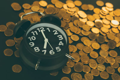 High angle view of clock on table