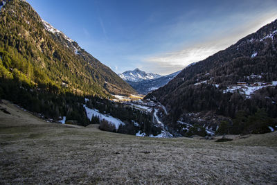 Scenic view of snowcapped mountains against sky