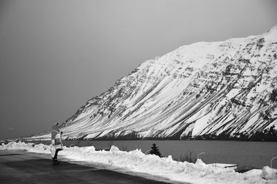 Snow covered mountain against sky