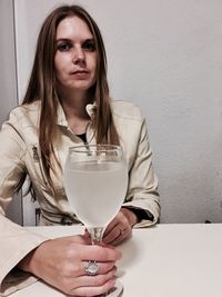 Portrait of woman holding ice cream