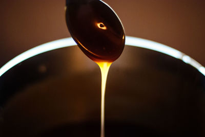 Close-up of syrup on spoon
