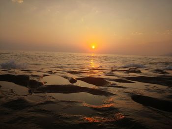 Scenic view of sea against sky during sunset