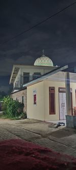 Exterior of building against sky at night