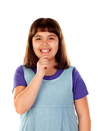 Portrait of smiling young woman against white background