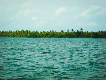 Scenic view of calm sea against sky