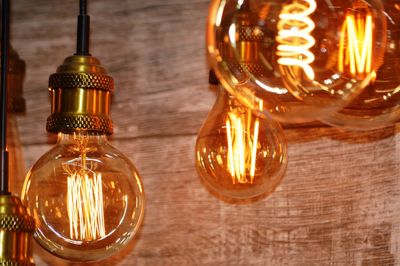 Close-up of illuminated light bulb