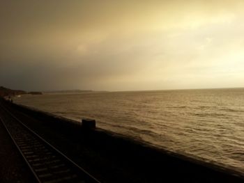 Scenic view of sea at sunset