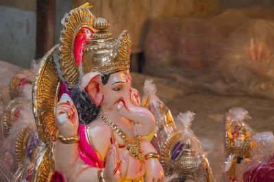 Close-up of ganesha idols